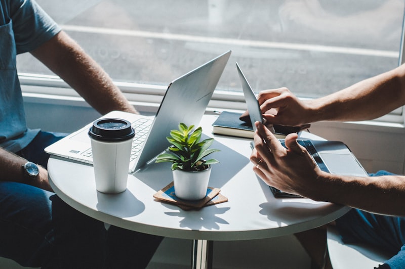 Laptop and phone on desk